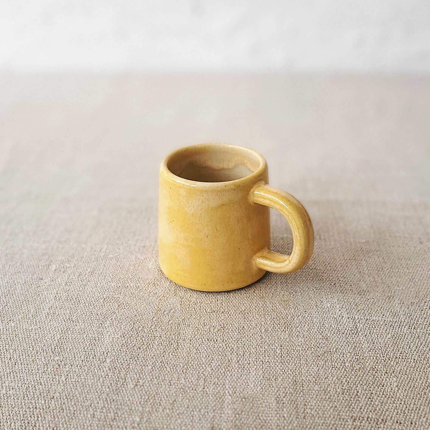 Small yellow espresso mug